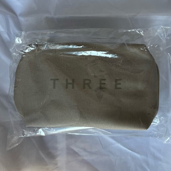 STARLUX Business Class Brown Canvas Amenity Kit by THREE w/ Pajamas - SEALED - Picture 3 of 4